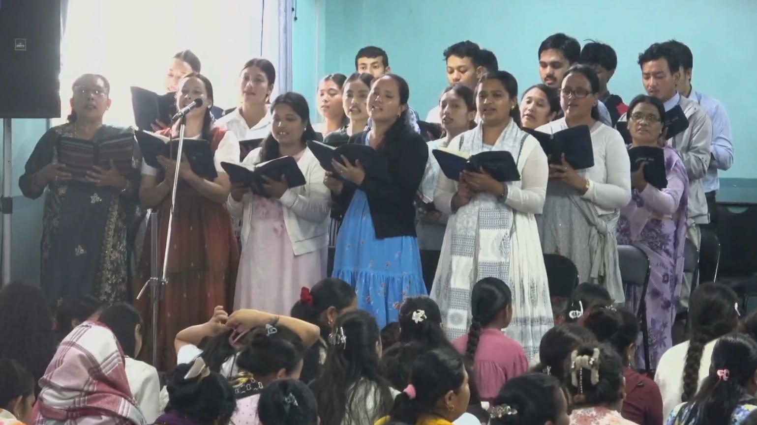 The Ebenezer church choir singing during worship